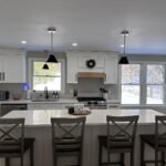 White shaker kitchen with large island and windows
